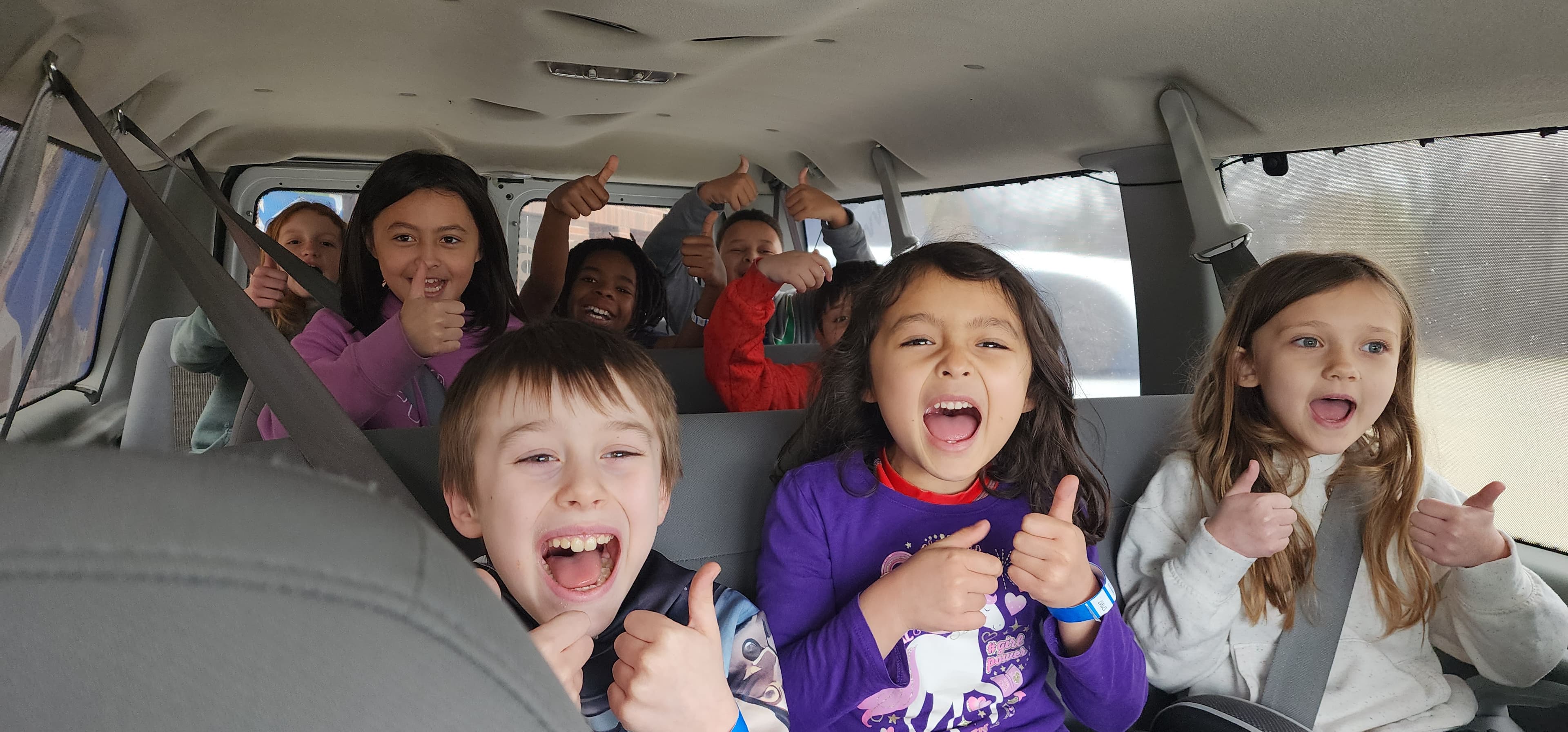 Campers smiling together on a school-break outing