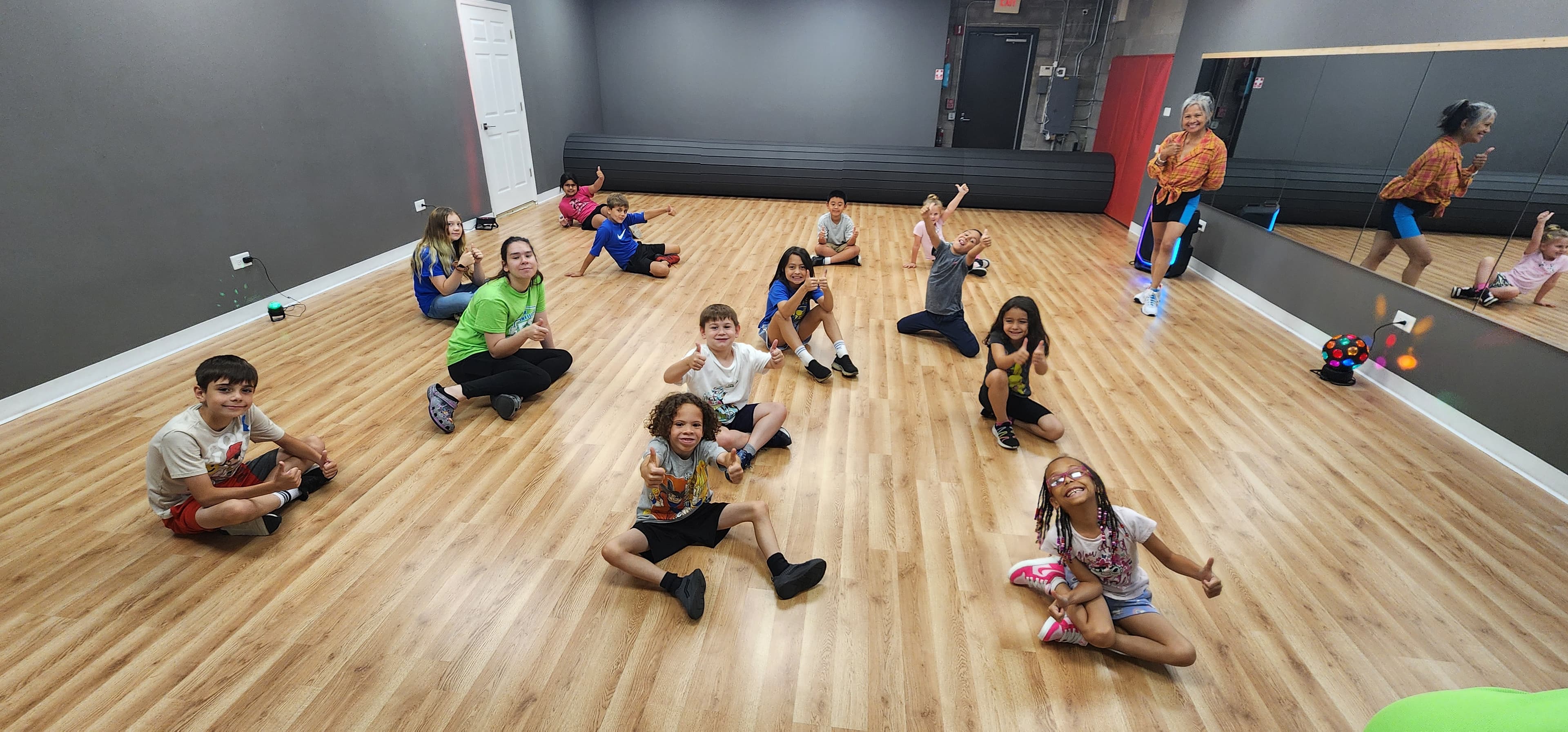 Campers moving together during a group dance activity