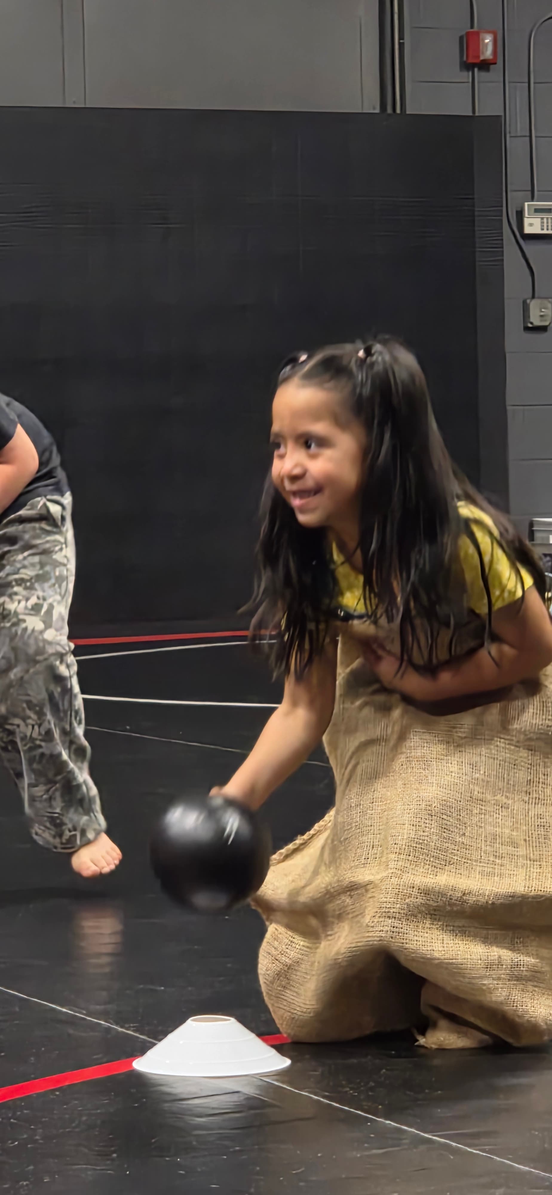 Camper taking part in an indoor activity