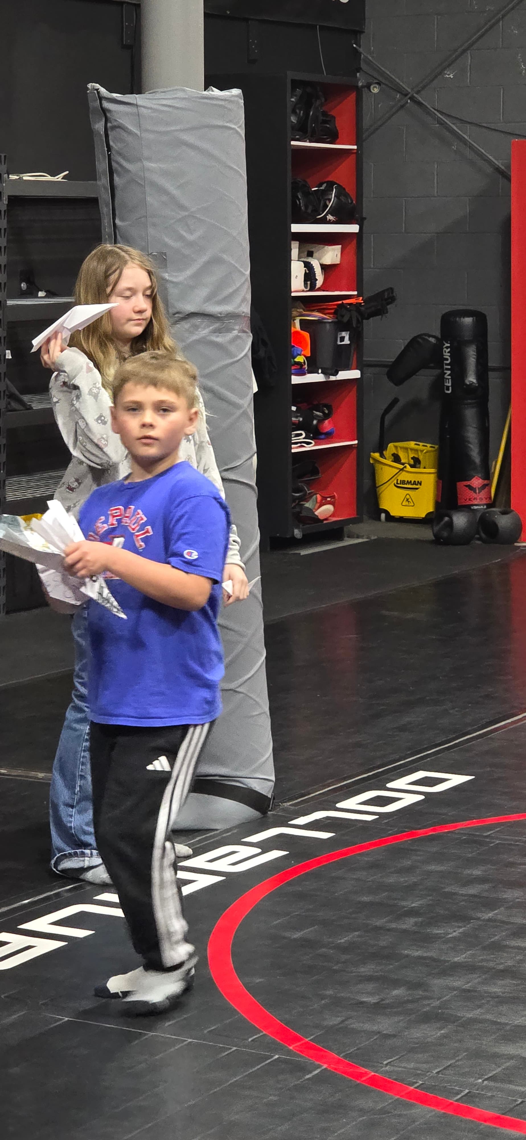 Camper taking part in an indoor sports activity