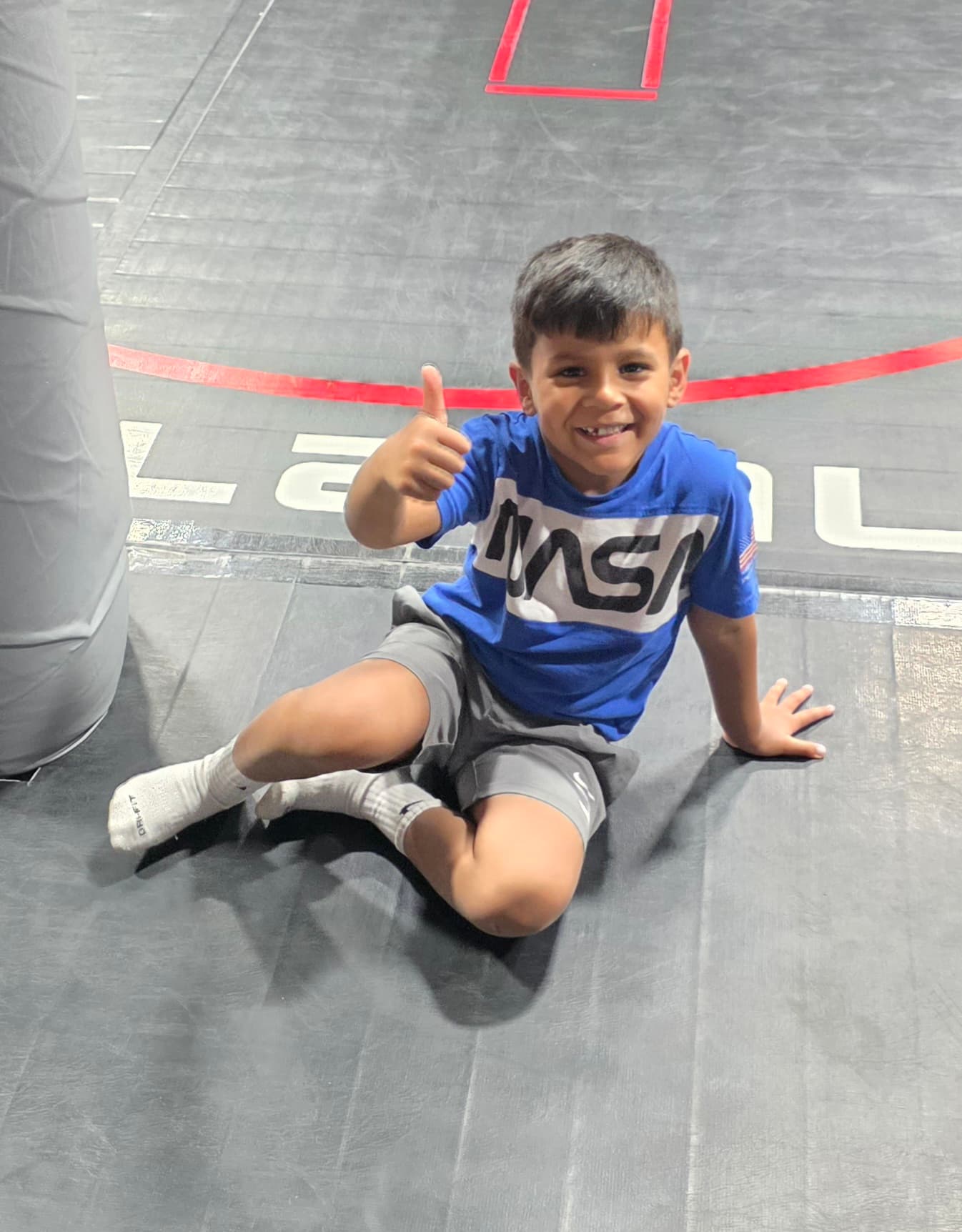 Camper taking part in an indoor activity