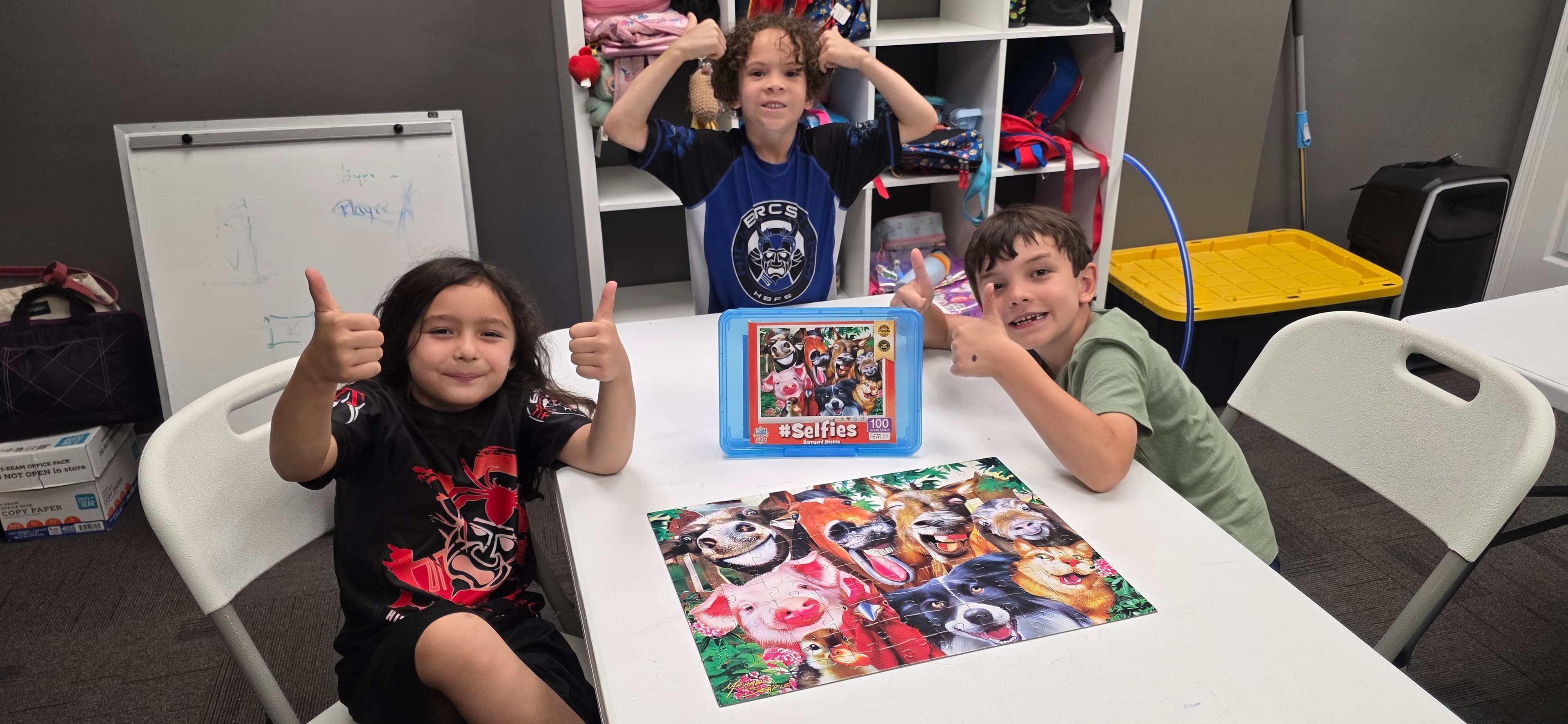 Campers sharing a creative table activity